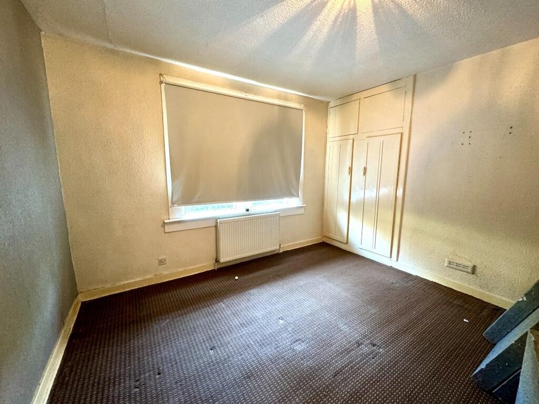 Bedroom, Coatbridge — before refurbishment